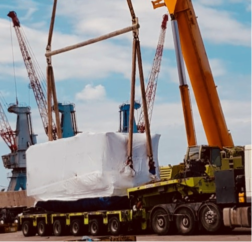 Shipment lifted by crane
